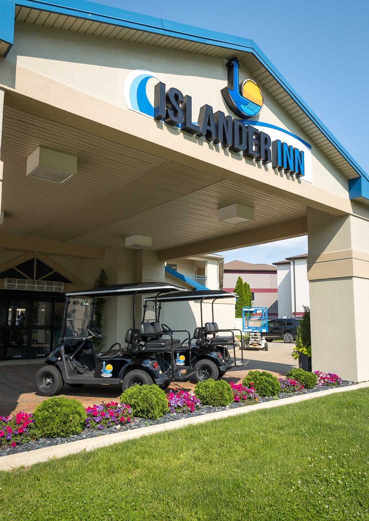 Islander Inn exterior - welcoming resort arrival view with sun-lit facade